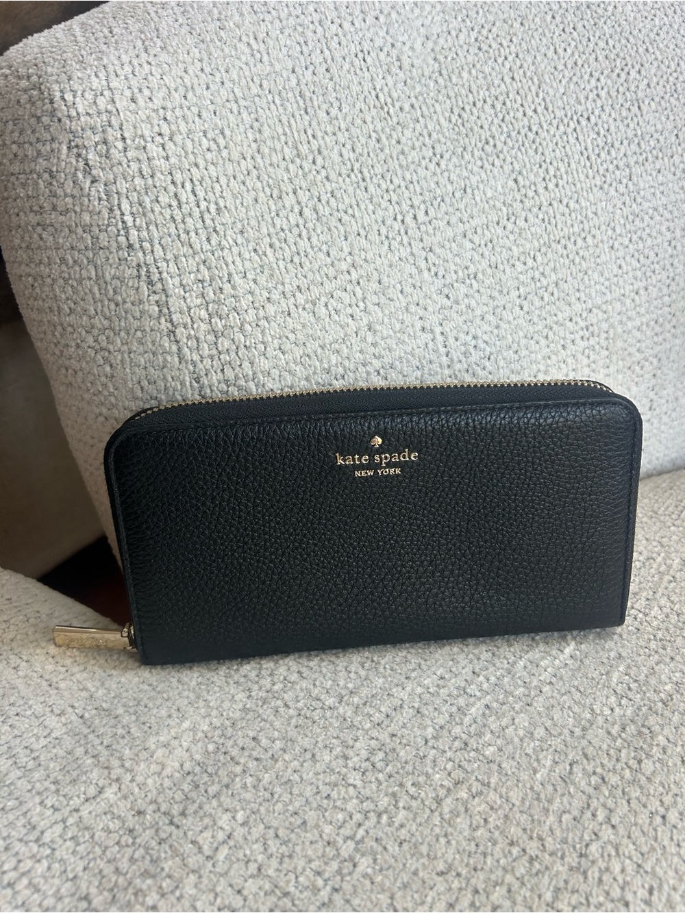 kate spade black pebbled leather zip-around wallet with gold hardware